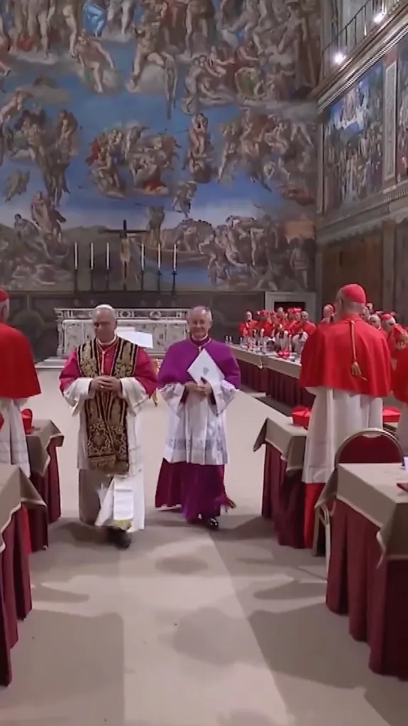 Pope Leo XIV exits the Sistine Chapel after he was elected to the papacy.