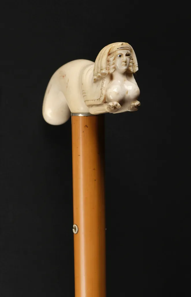 Walking stick with an ivory sphinx head.