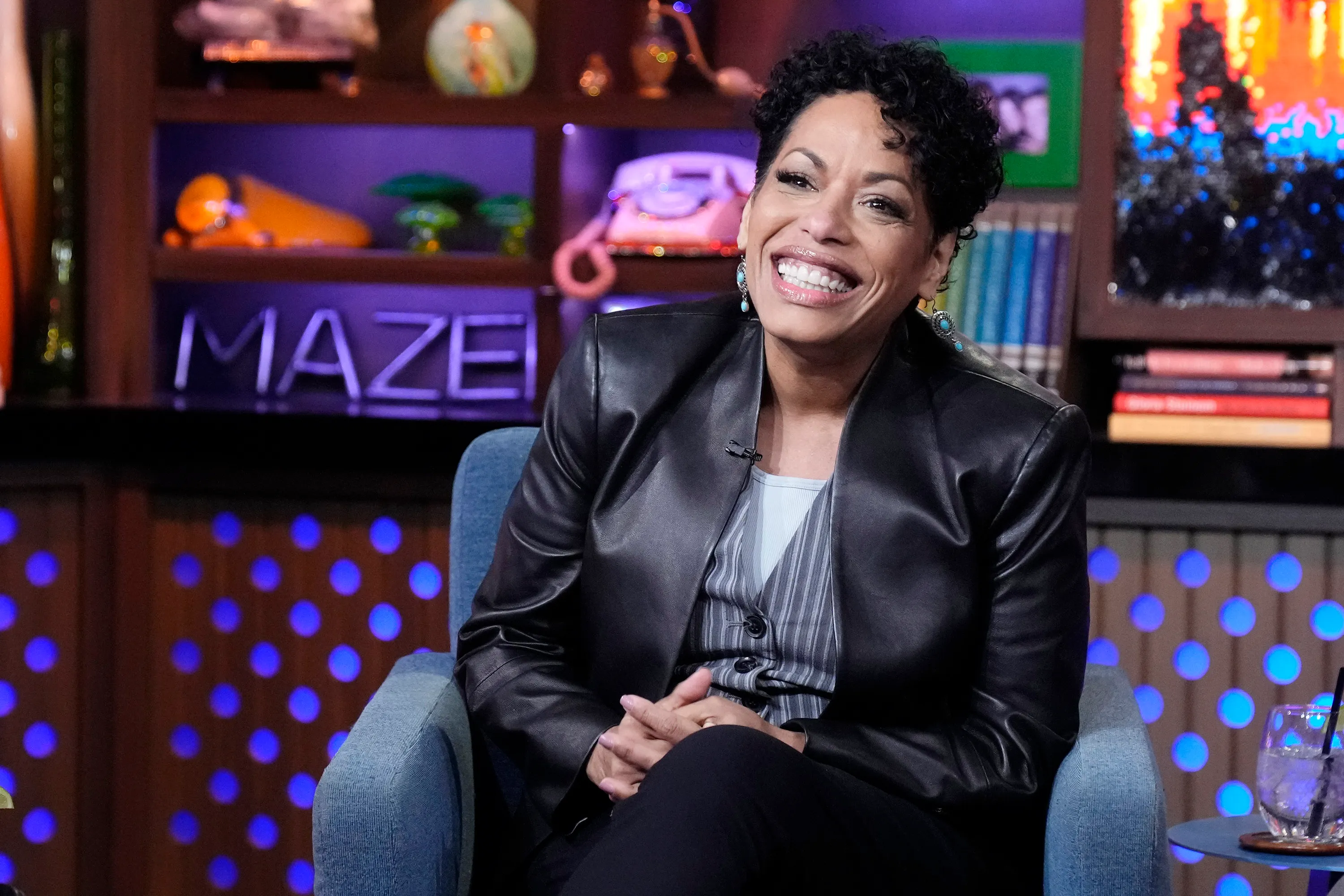 Liza Colón-Zayas smiling on 