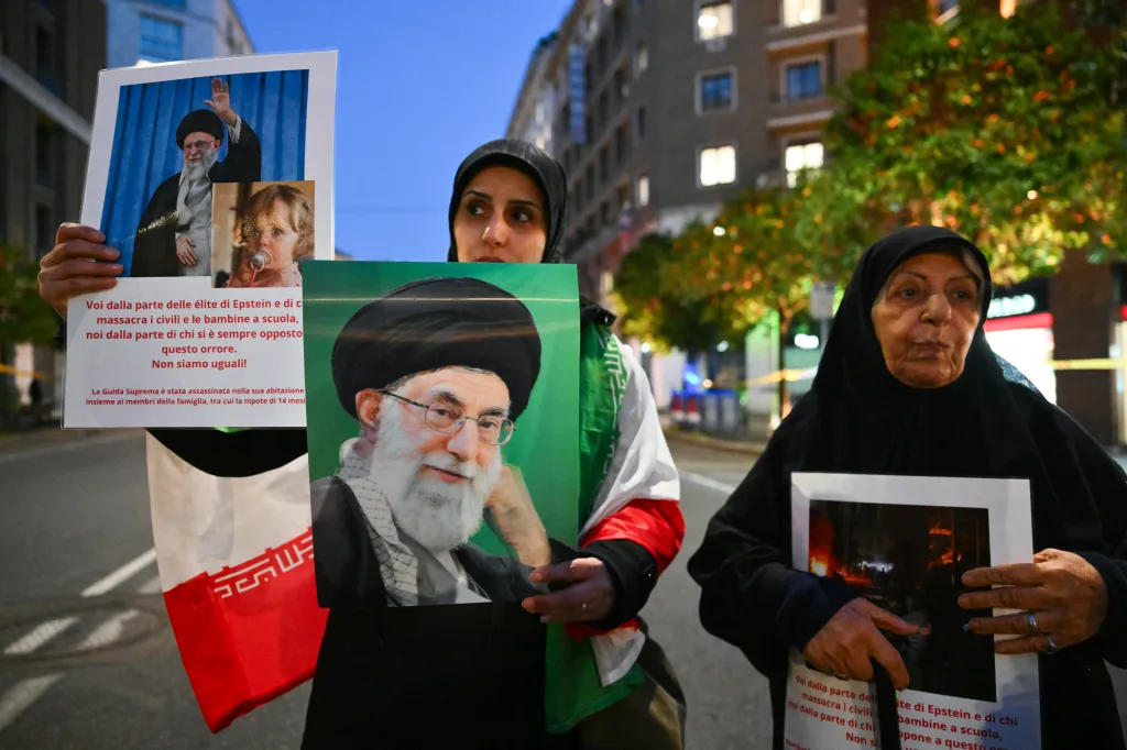 A woman holds up a photo of Ali Khamenei during a pro-Iranian regime protest outside the US Embassy in Rome on March 3, 2026.
