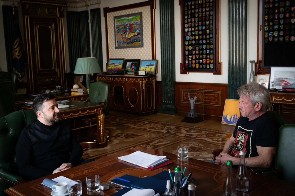 Ukraine's President Volodymyr Zelensky meets with US actor Sean Penn in his office in Kyiv.