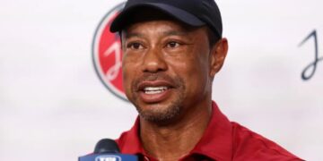 Tiger Woods arrested and charged with DUI, crawled out of Land Rover after rollover car crash