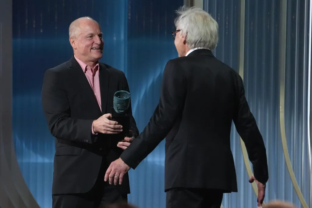 Woody Harrelson presenting the lifetime achievement award to Harrison Ford.