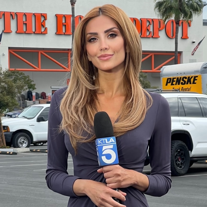 Ellina Abovian, fired KTLA anchor, holding a microphone in front of a Home Depot.