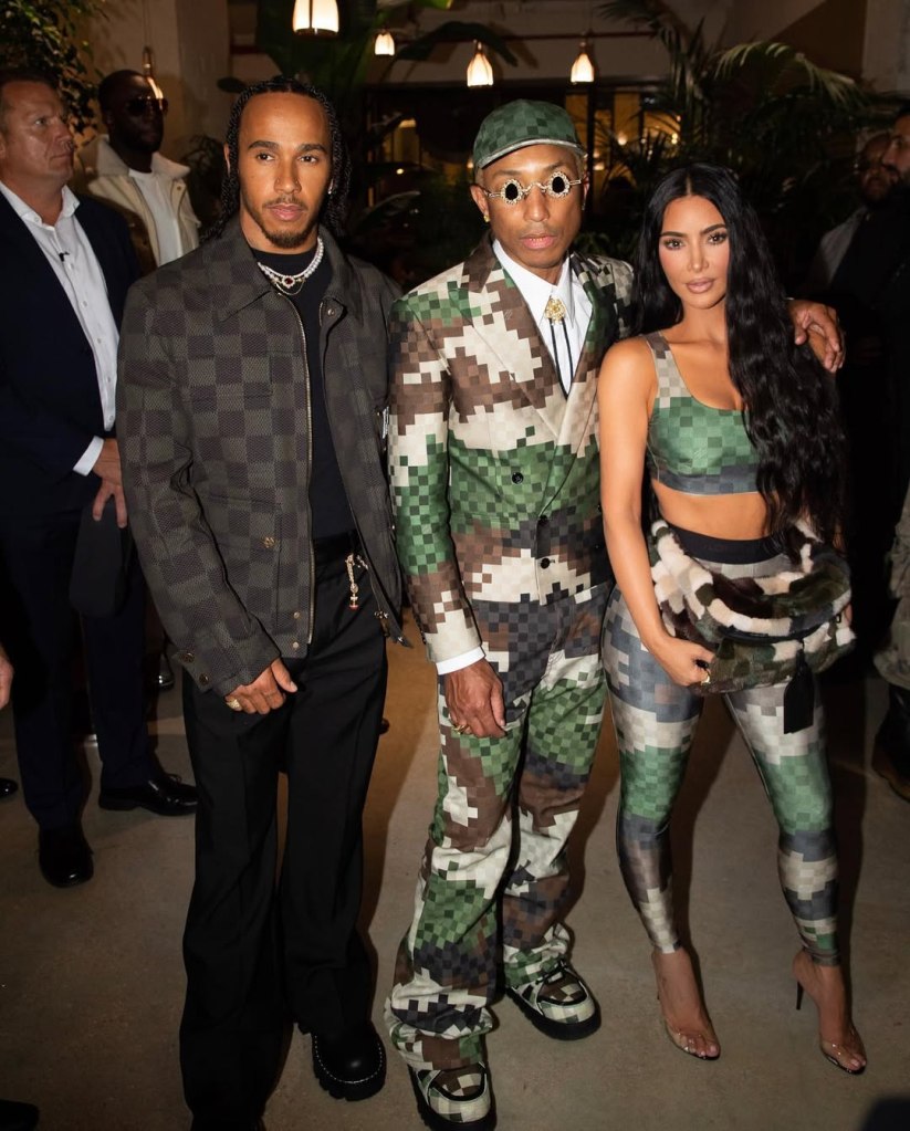 Kim Kardashian, Lewis Hamilton, and Pharrell Williams at the Louis Vuitton show.