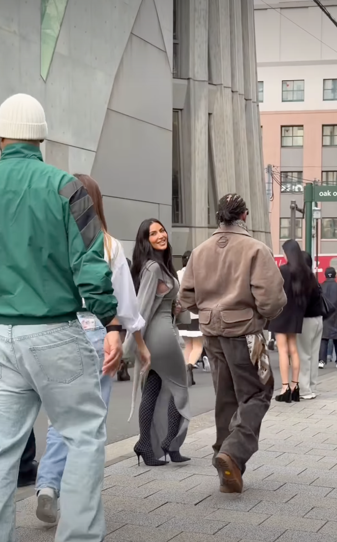 Kim Kardashian and Lewis Hamilton walking in Tokyo.