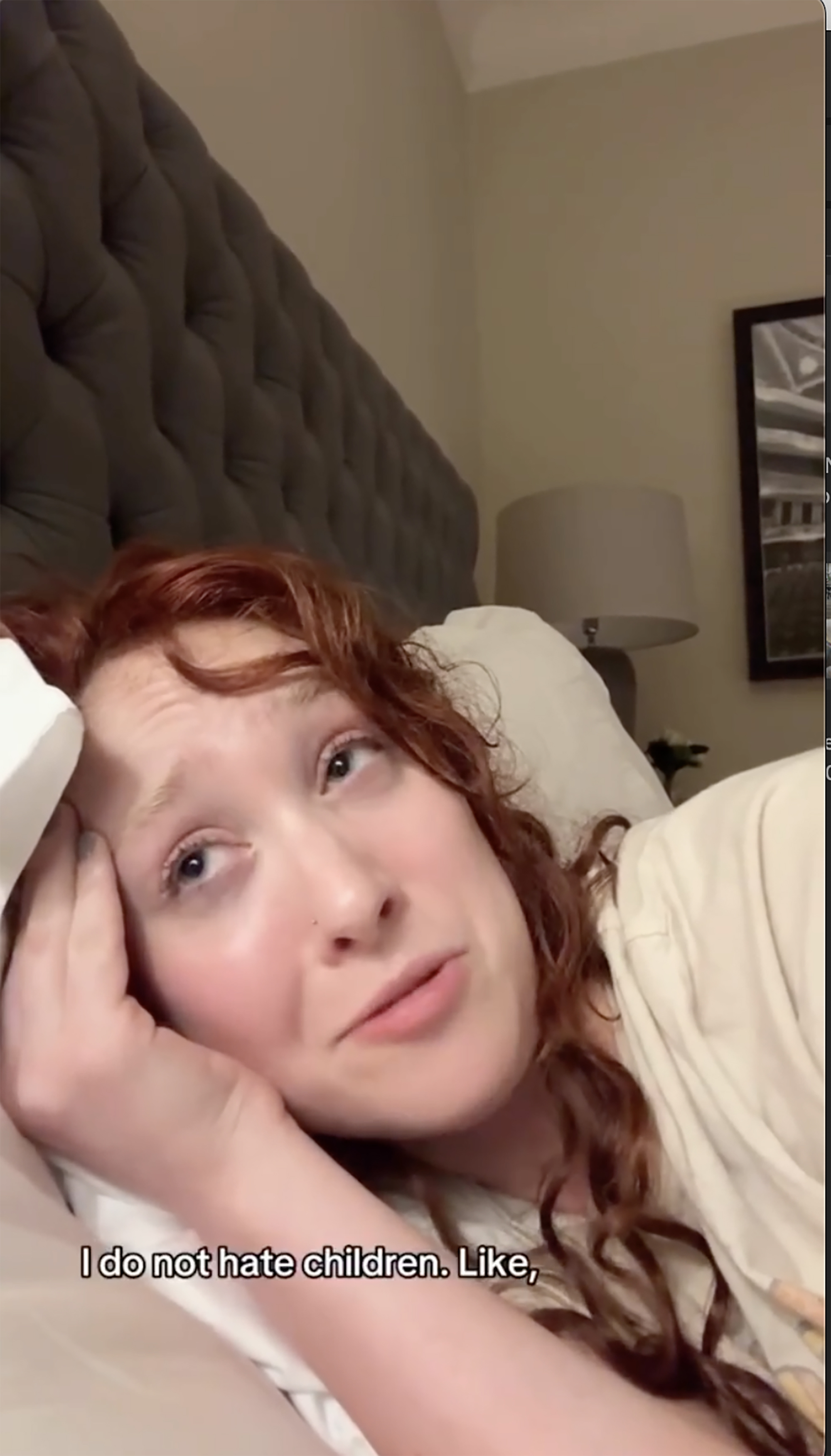 Chappell Roan lying in bed with the text