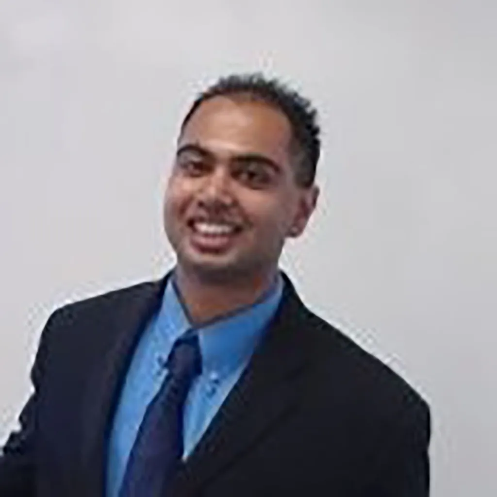 Headshot of Fazlul Zubair smiling.