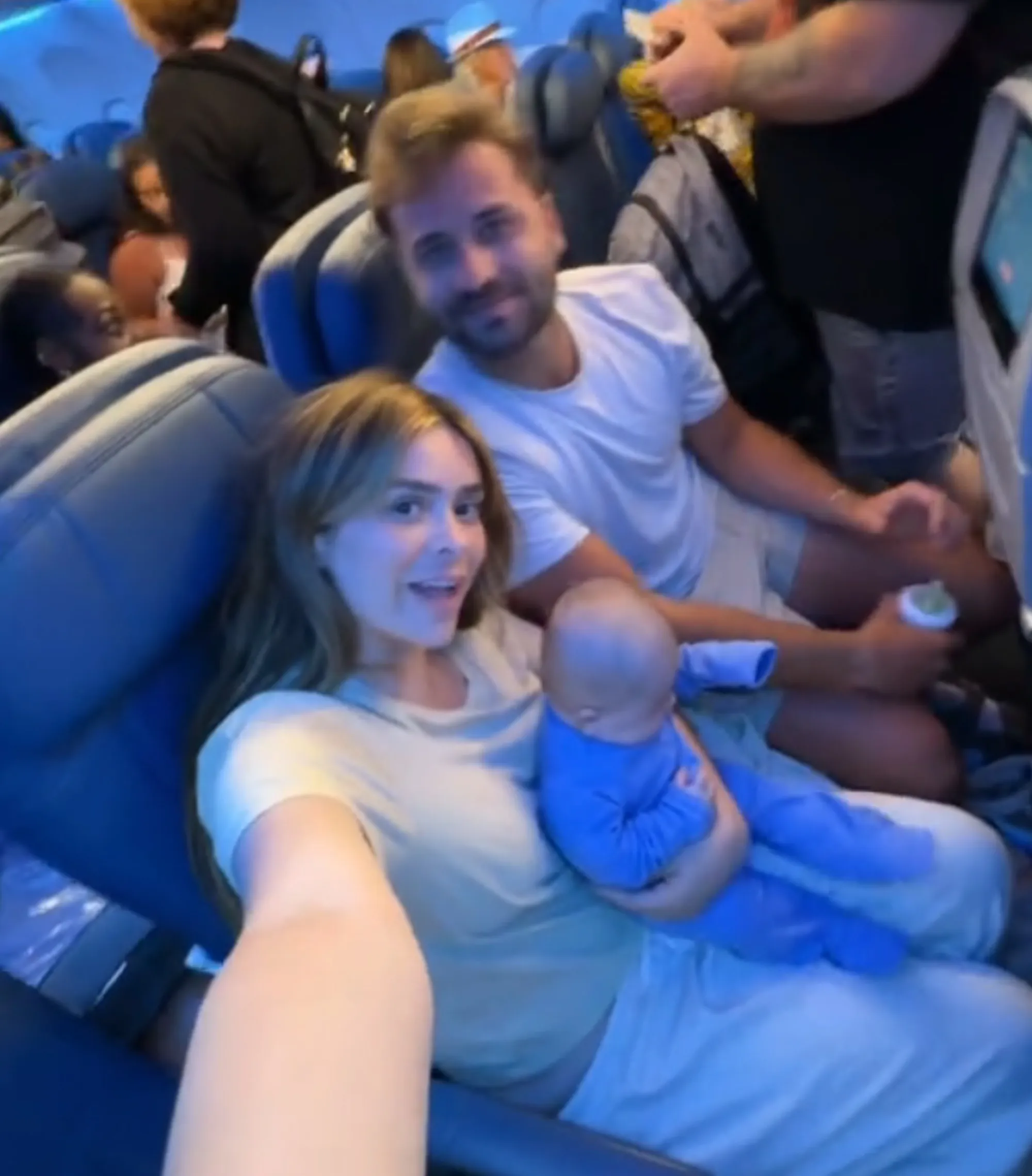 Taylor Frankie Paul and Dakota Mortensen on a plane with a baby.