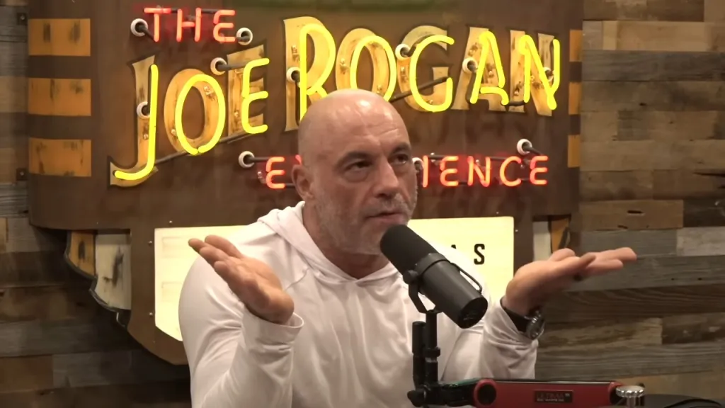 Joe Rogan gesturing with his hands during an interview.