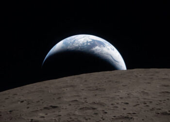 First Photos From NASA Moon Flyby Show Setting Earth and Eclipse