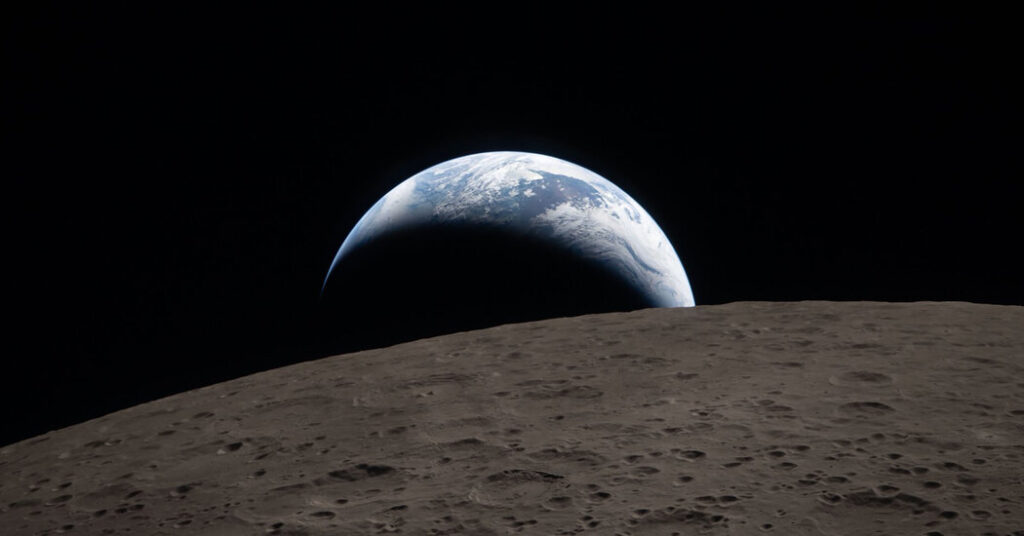 First Photos From NASA Moon Flyby Show Setting Earth and Eclipse