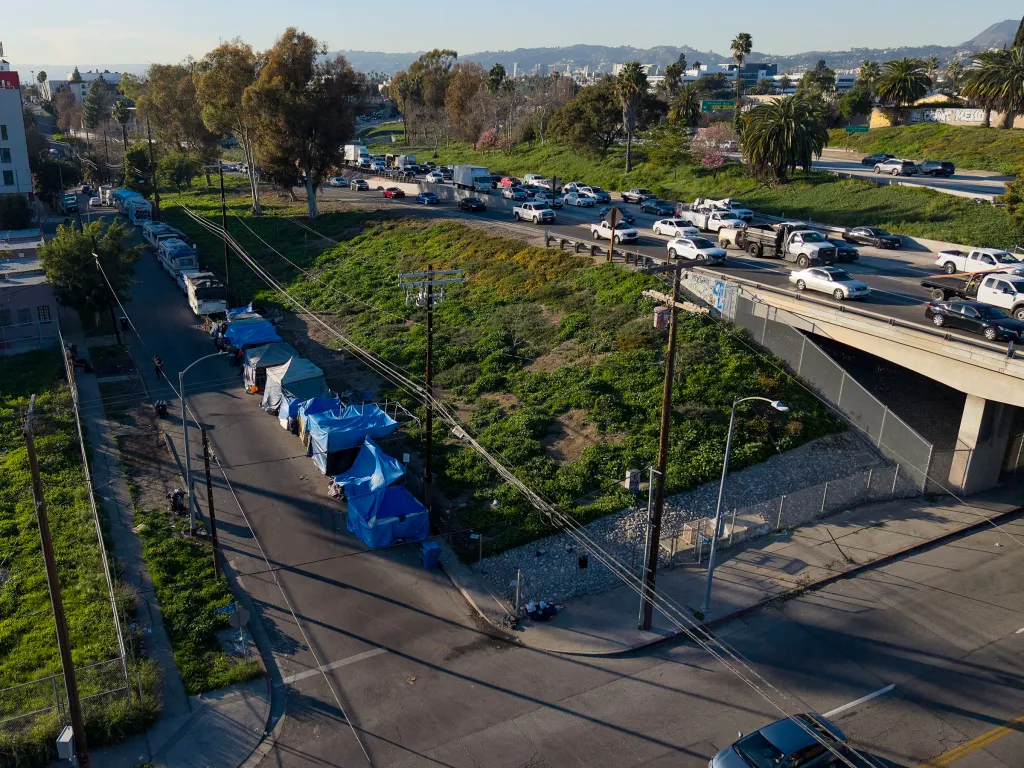 Homeless encampments along Silverlake Blvd near the 101 Freeway in Los Angeles.