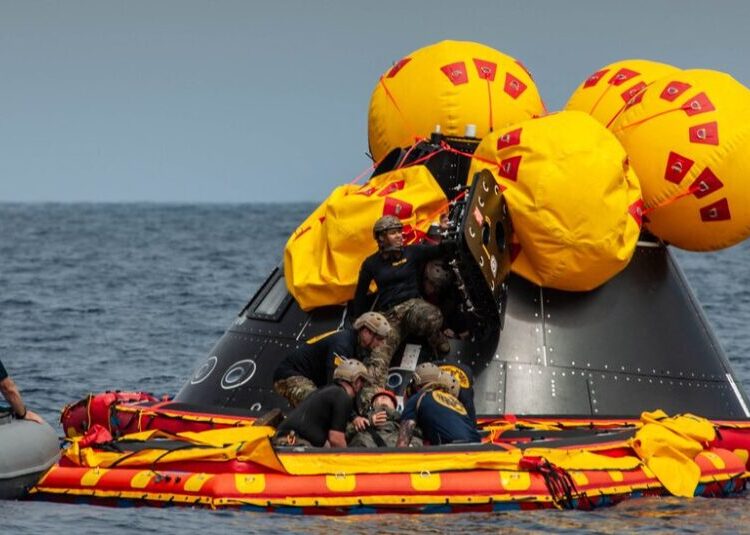 After Splashdown, Bring in the Navy Divers