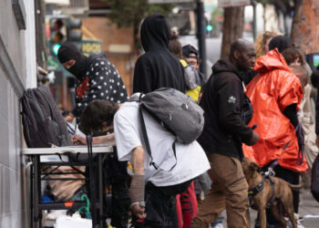 These Masked Men in San Francisco Want One Thing: Your Signature