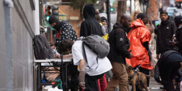 These Masked Men in San Francisco Want One Thing: Your Signature