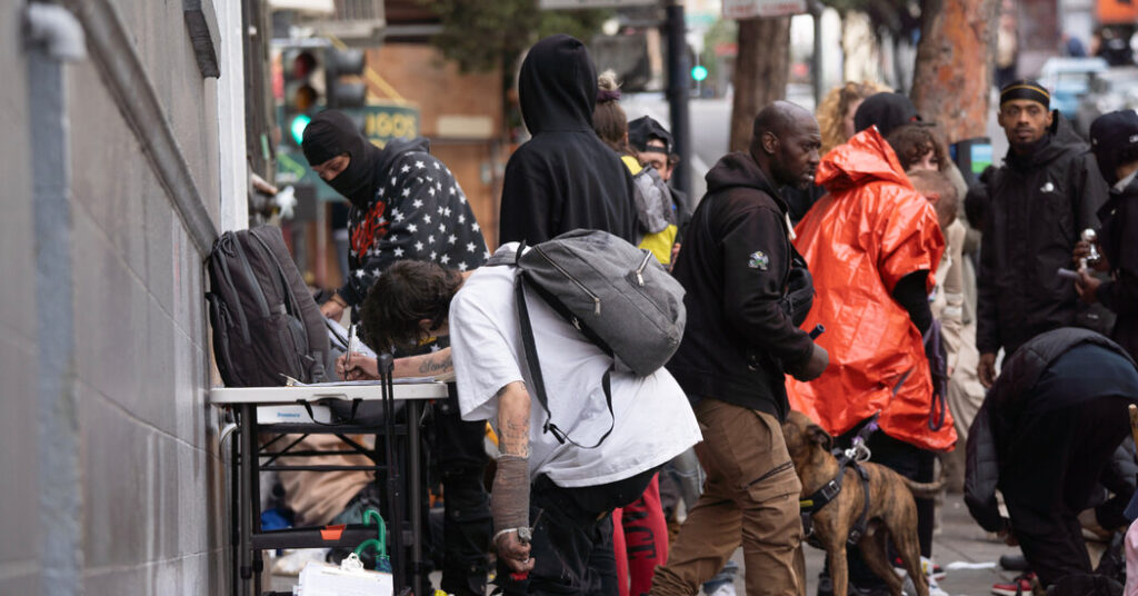 These Masked Men in San Francisco Want One Thing: Your Signature