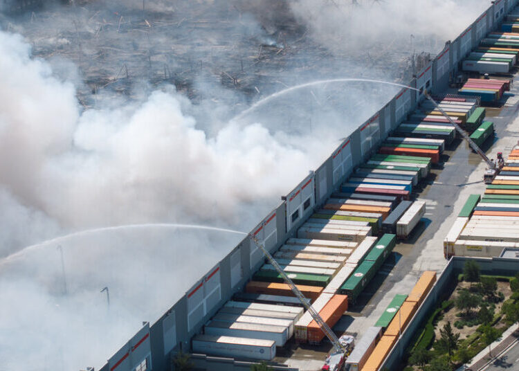 Man Accused of Warehouse Arson Invoked Mangione, Court Files Say