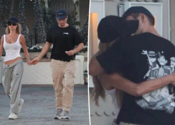 Brooks Nader and Taron Egerton passionately kiss during LA date night