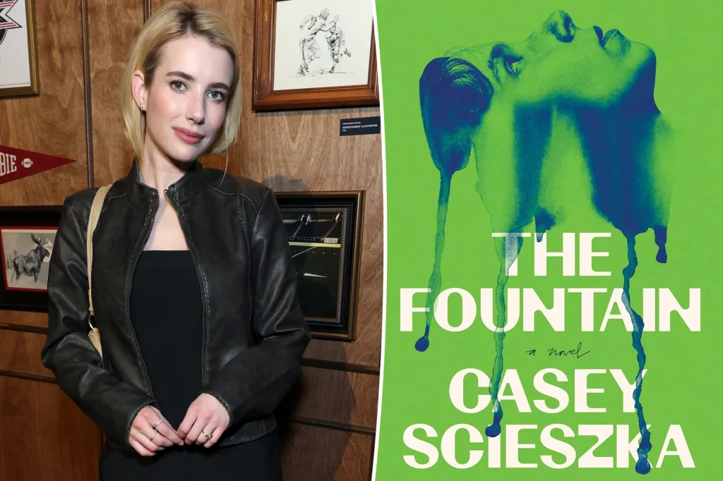 Emma Roberts poses next to the book cover for 