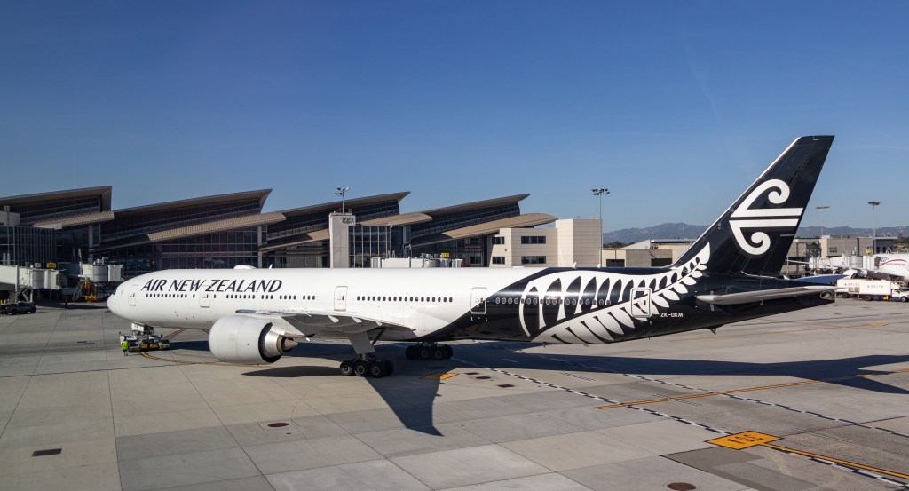 Air New Zealand Boeing 777-300ER being towed to a gate at Los Angeles International Airport (LAX).