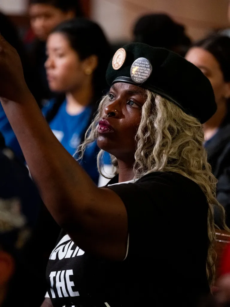 A woman wearing a beret with 