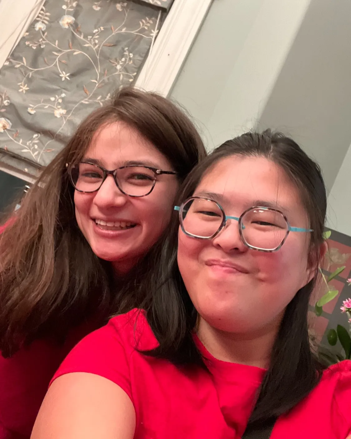 Tina Zhu Xi Caruso and Pari Kim smiling.