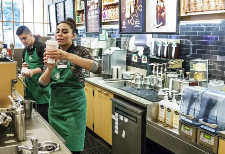 Starbucks is offering $1,200 bonuses, expanded tipping, and weekly payouts to boost the pay of its U.S. baristas