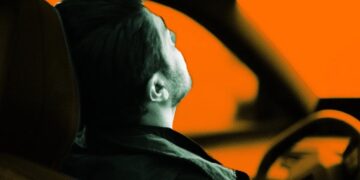 Man Caught Sleeping Behind the Wheel While FSD Tesla Cruises the Streets After Decadent Feast of Wine and Pizza