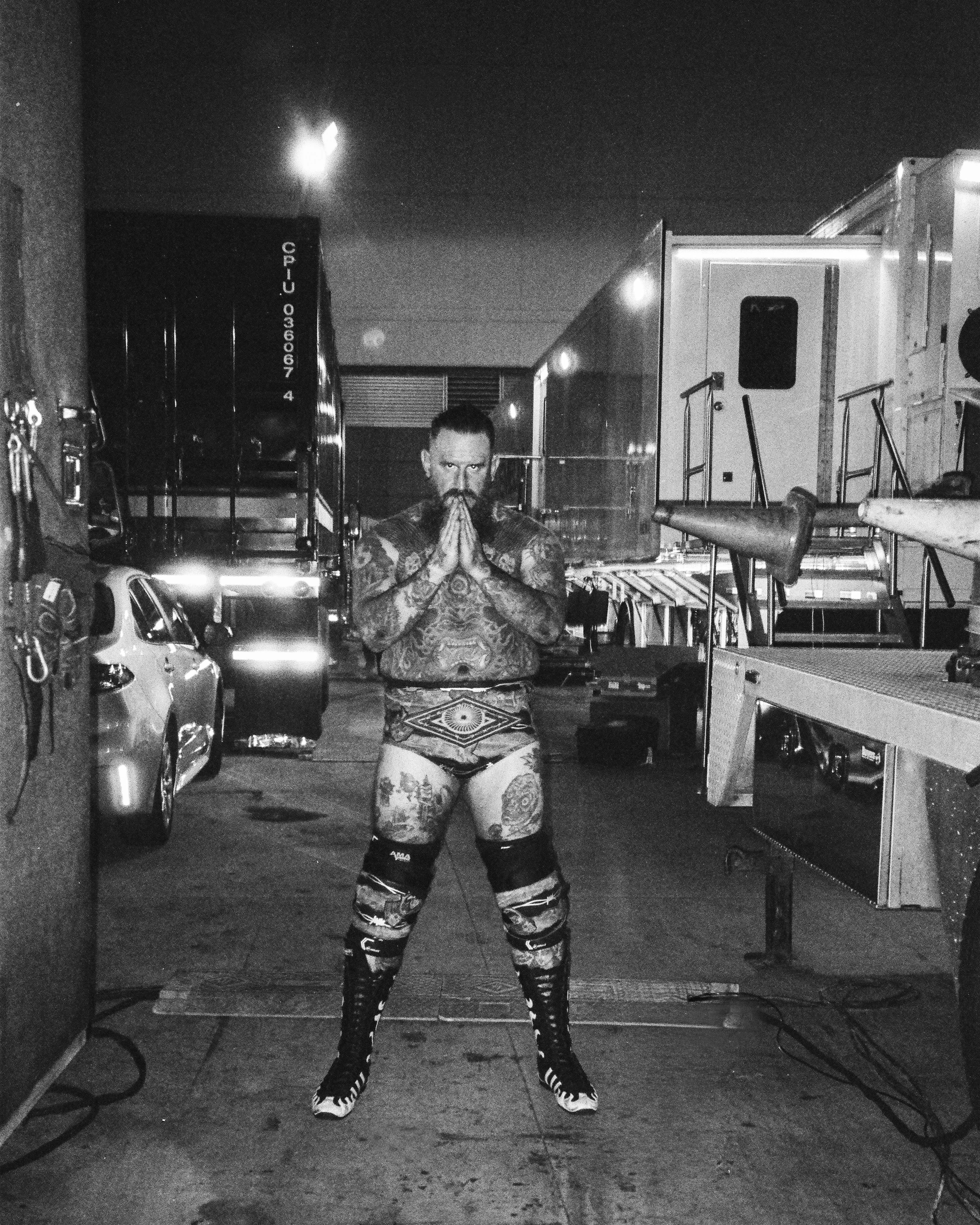 A black and white photograph of Brody King at night after a fight