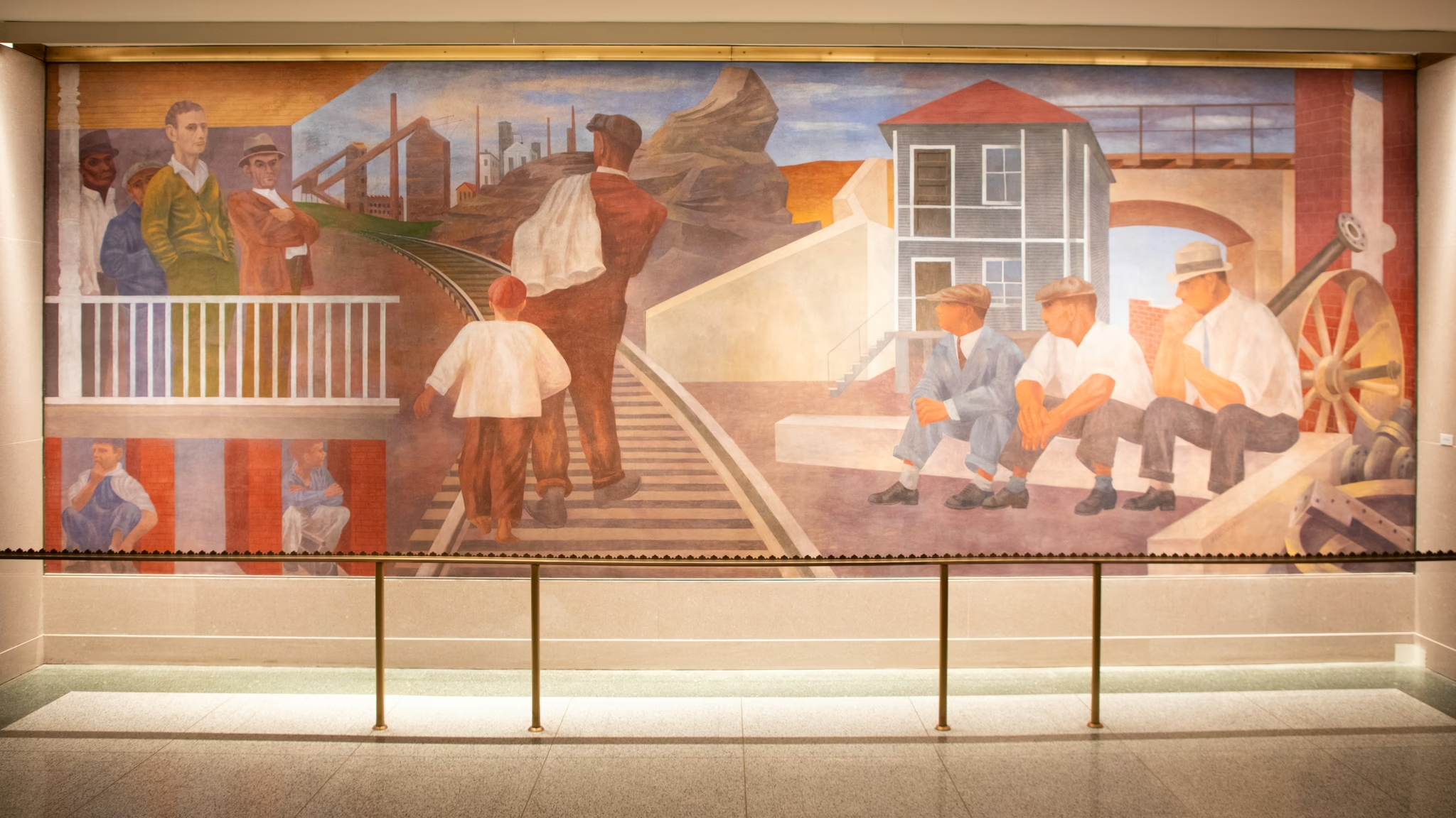 Ben Shahn’s mural on one wall of a corridor in the Cohen building portrays unemployed men before the advent of Social Security. On the opposite wall, he painted his vision of bustling life afterward.