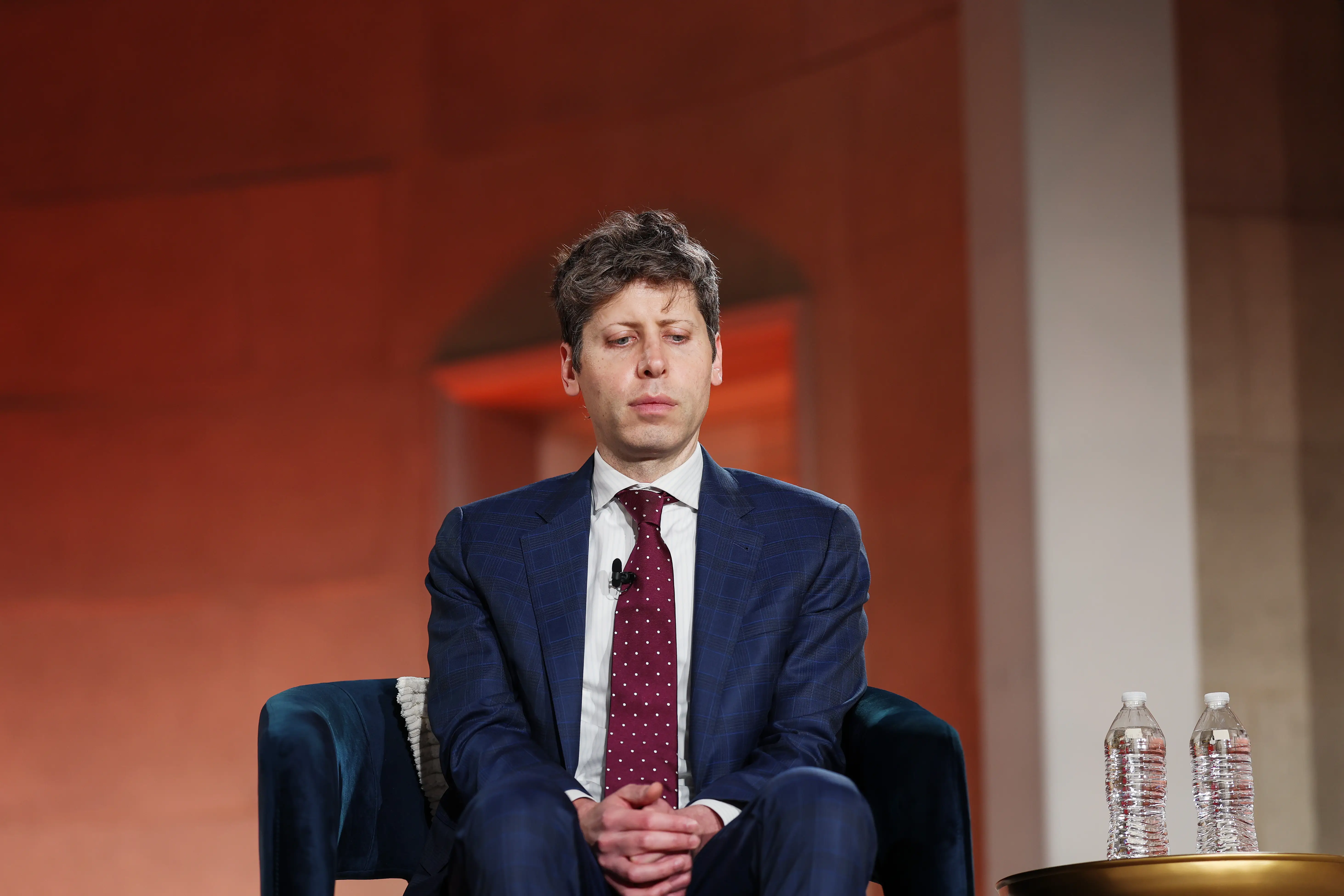 MARCH 11: OpenAI CEO Sam Altman speaks during the BlackRock Infrastructure Summit on March 11, 2026 in Washington, DC. The global investment management company held the summit consisting of leaders from government, business, and labor to address expanding U.S. infrastructure. (Photo by Anna Moneymaker/Getty Images)