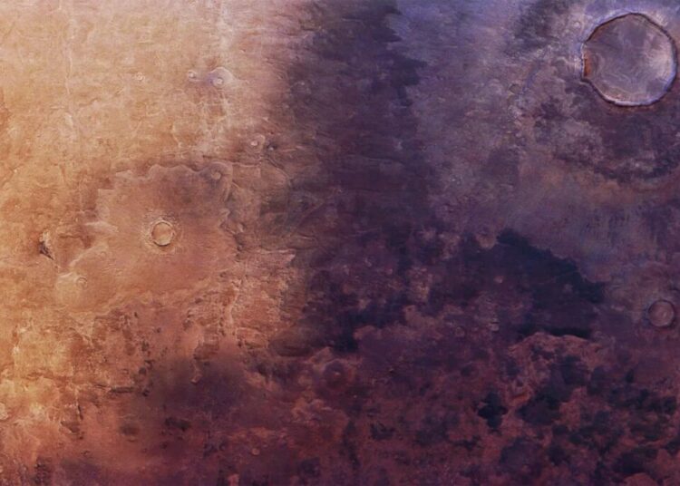 Scientists Puzzled by Huge Shadowy Blight Spreading Across Surface of Mars