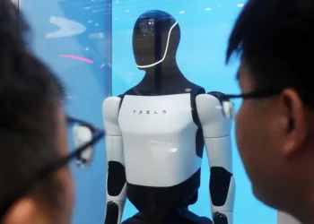 Elon Musk says copycats are why Tesla can’t unveil Optimus sooner