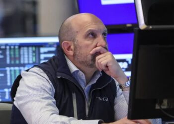 Stocks retreat from record highs as Tesla weighs on Wall Street and oil jumps on Iran uncertainty