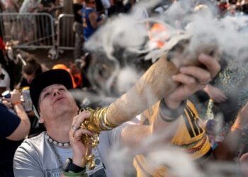 Photos of the Week: Giant Octopus, Scooter Waterfall, Sunrise Panorama