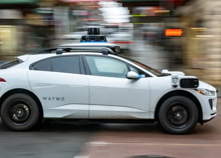 Waymo, Alphabet’s robotaxi service, is growing fast. Here’s how to ride, costs, and the self-driving cars’ crash record.