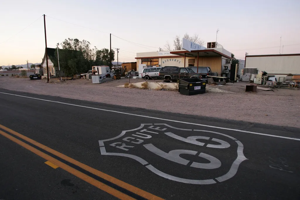 A symbol of the original Route 66 road sign painted on the highway in Daggett, California.