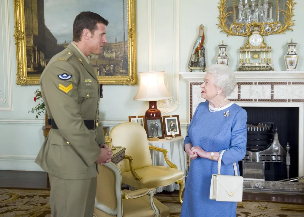 Ben Roberts-Smith meets with Queen Elizabeth II during a visit to Buckingham Palace in London, England, on Nov. 15, 2011.