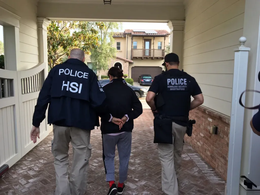 Dongyuan Li is arrested by Federal agents.