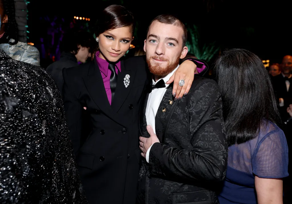 Zendaya and Angus Cloud pose at the 2022 Vanity Fair Oscar Party.
