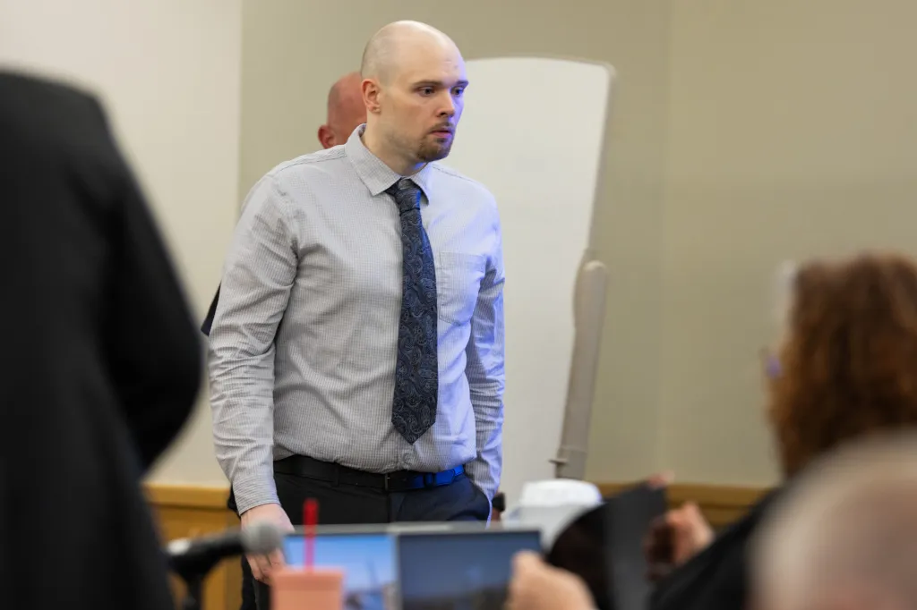 Tanner Horner walking into the courtroom during the first day of his capital murder trial.