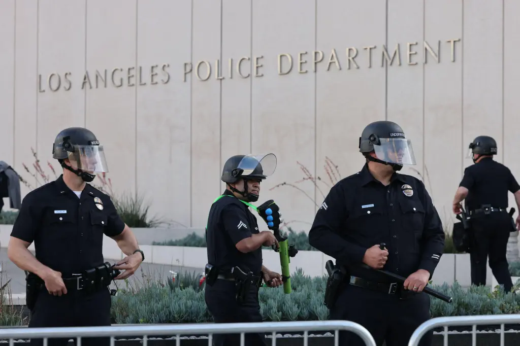 LAPD officers guard the Los Angeles Police Department headquarters during a protest.