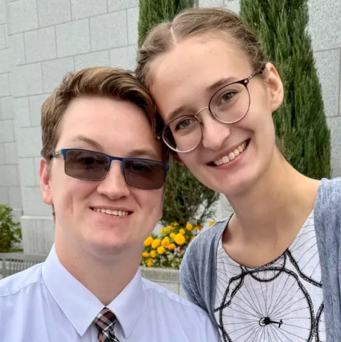 Photo of William Micah Carter and Jennifer Lynn Lower smiling at the camera.