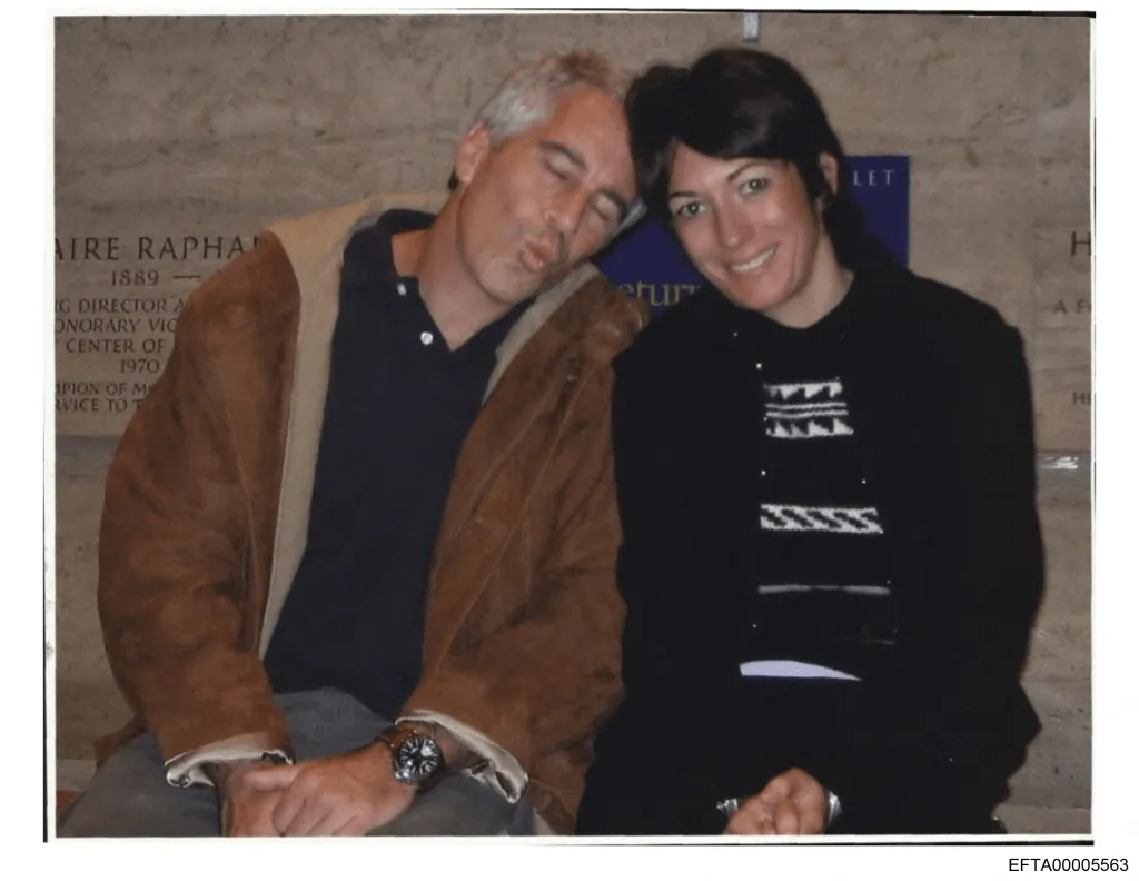 Jeffrey Epstein making a pucker face while leaning his head on Ghislaine Maxwell's shoulder, who is smiling.