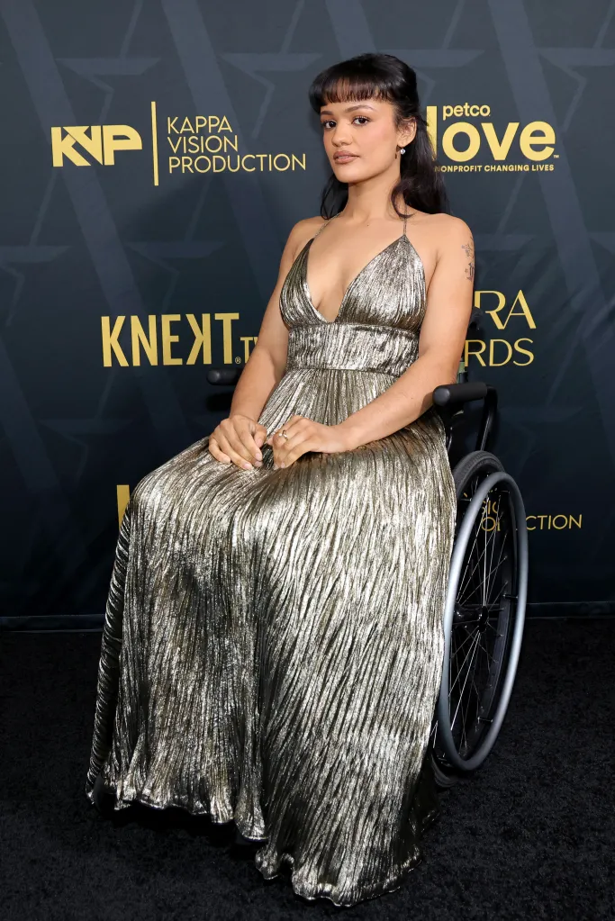 Marissa Bode in a metallic gold gown, seated in a wheelchair, at the 2026 Astra Film Awards.