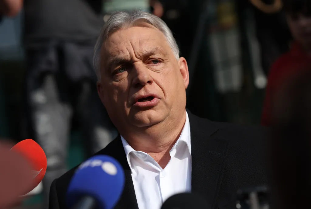 Hungarian Prime Minister Viktor Orban speaking to the media after casting his ballot in parliamentary elections.