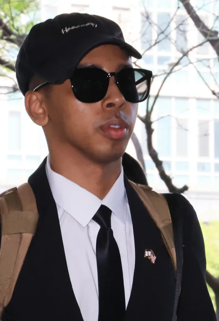 YouTuber Johnny Somali arrives at the Seoul Western District Court on April 15, 2026.