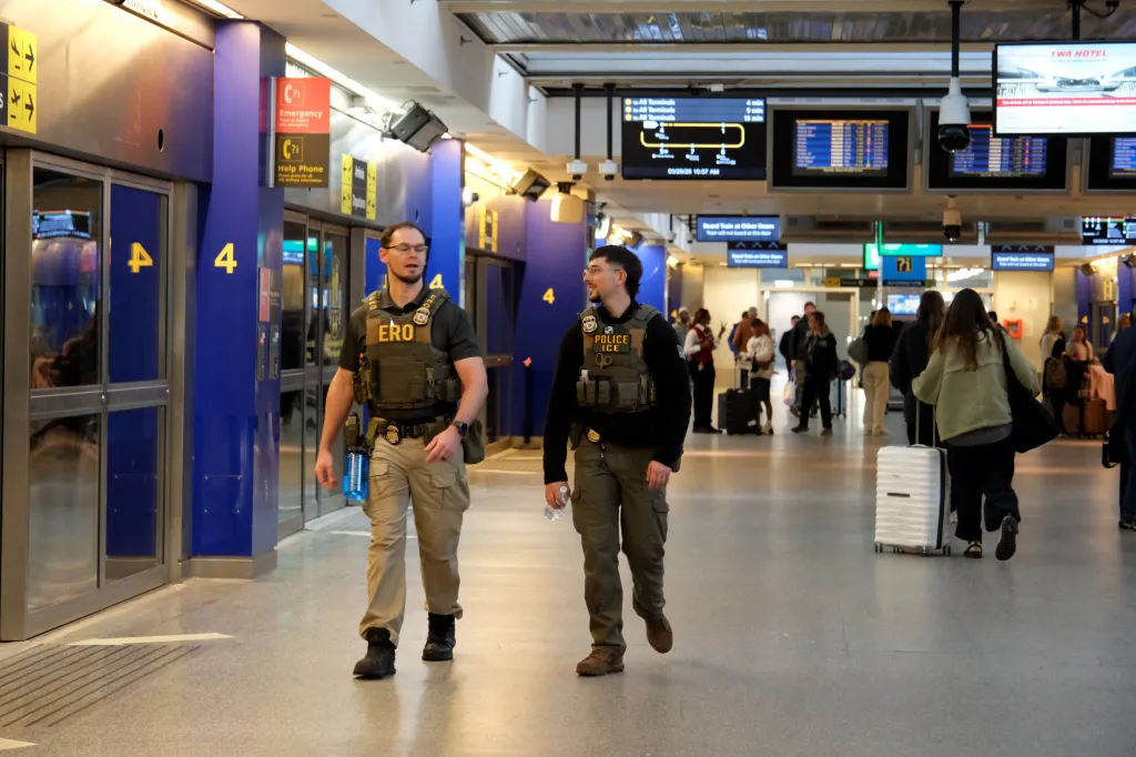 ICE officers patrol Terminal 4 at JFK International Airport on March 28, 2026.
