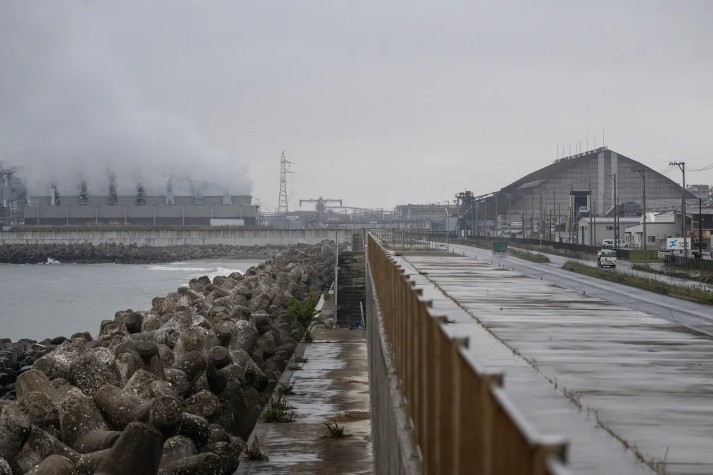 Steam rises out of a power station protected by a tsunami sea wall in Ishinomaki, Miyagi Prefecture on April 27, 2026.